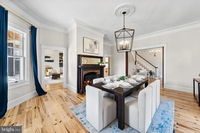 a stove top oven sitting inside of a kitchen