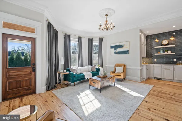 a kitchen that has a sink and a stove