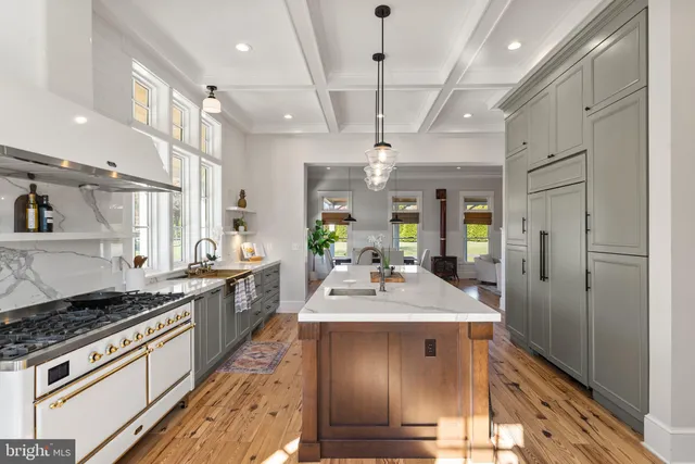 a view of a back yard of the house and front view of a house