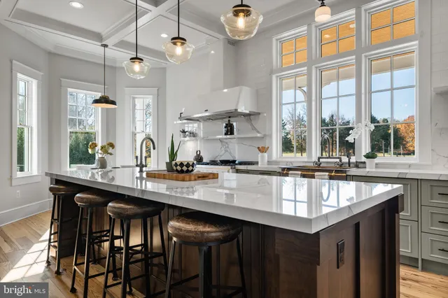 a view of an empty room with a fireplace