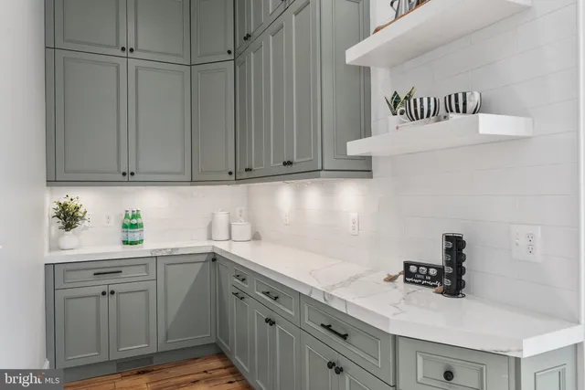 a living room with lots of furniture and a flat screen tv