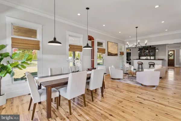 a view of a kitchen with a sink and cabinets