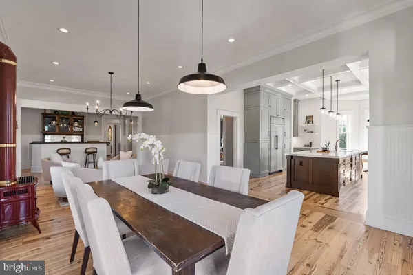 a view of a house with backyard porch and sitting area