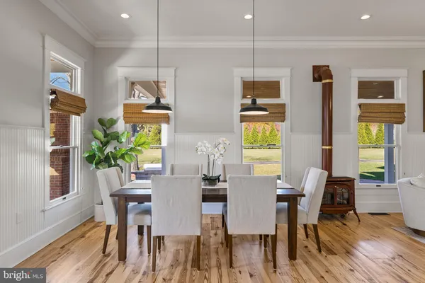 a view of a back yard of the house and front view of a house
