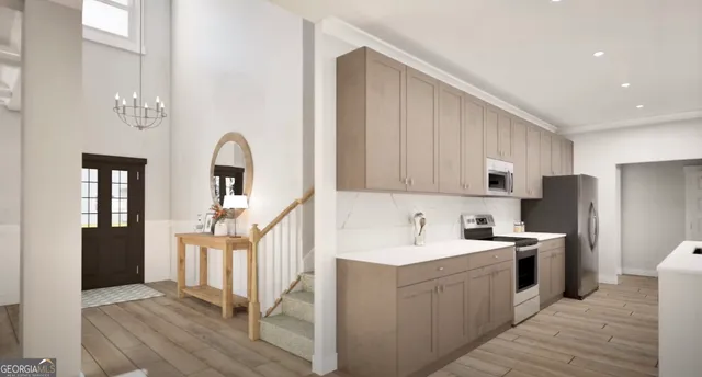 a kitchen with a sink a refrigerator and cabinets