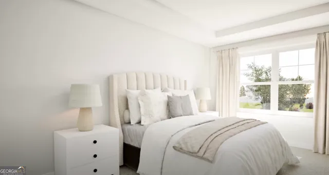 a bedroom with a bed and a large window