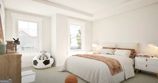 a bedroom with bed and a large mirror