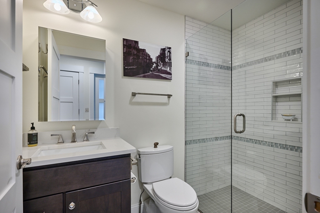 23 Ford Crossing Northampton, MA 01060 - Photo 17 of 34 a bathroom with a sink a toilet and shower