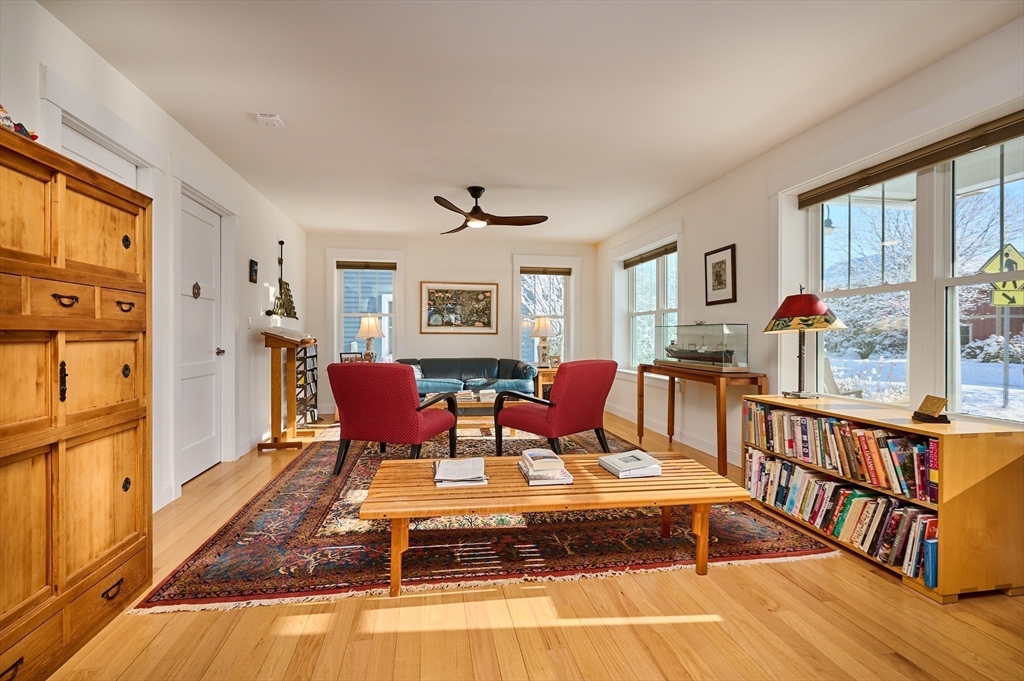 23 Ford Crossing Northampton, MA 01060 - Photo 8 of 34 a living room with furniture fireplace and a window