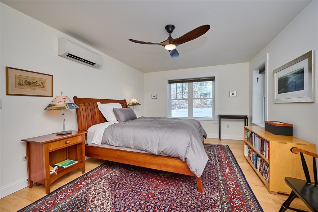 23 Ford Crossing Northampton, MA 01060 - Photo 10 of 34 a bed room with a bed and a tv