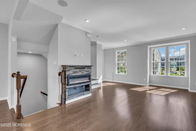 a view of kitchen with furniture and a chandelier