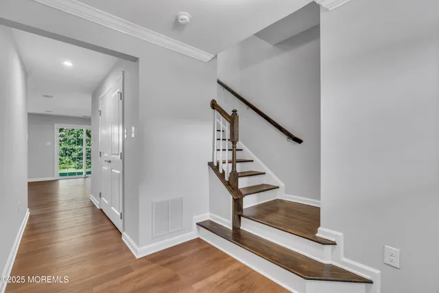 a view of entryway with wooden floor