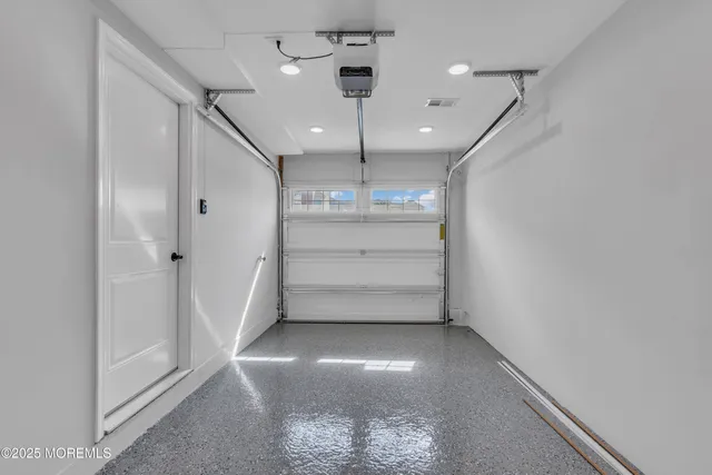 a view of entryway with livingroom and wooden floor