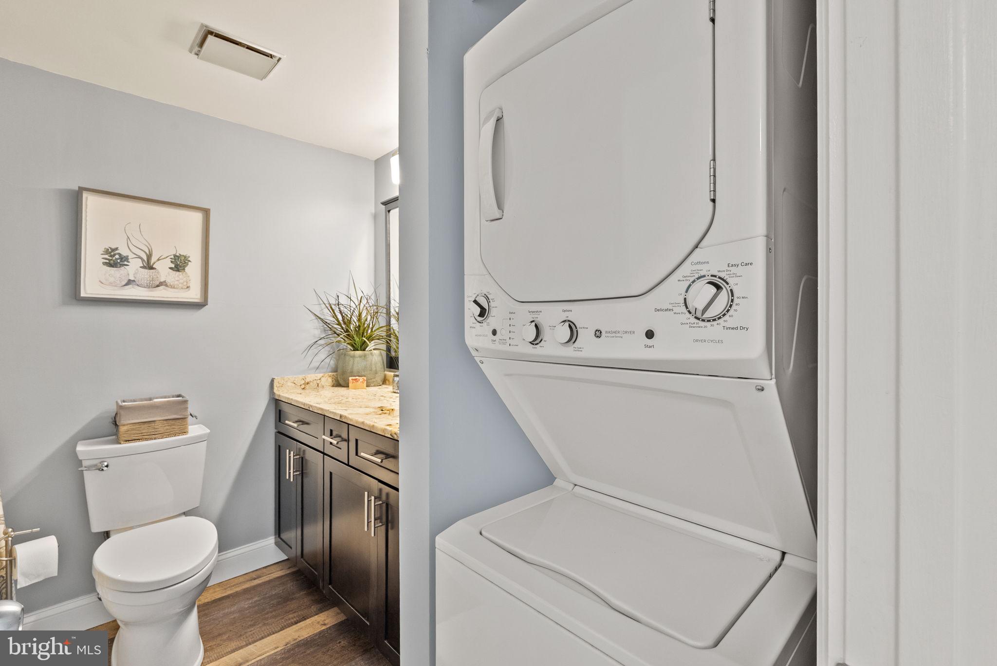 649 C Street Southeast, Unit 304 Washington, DC 20003 - Photo 21 of 37 a bathroom with a toilet and a sink