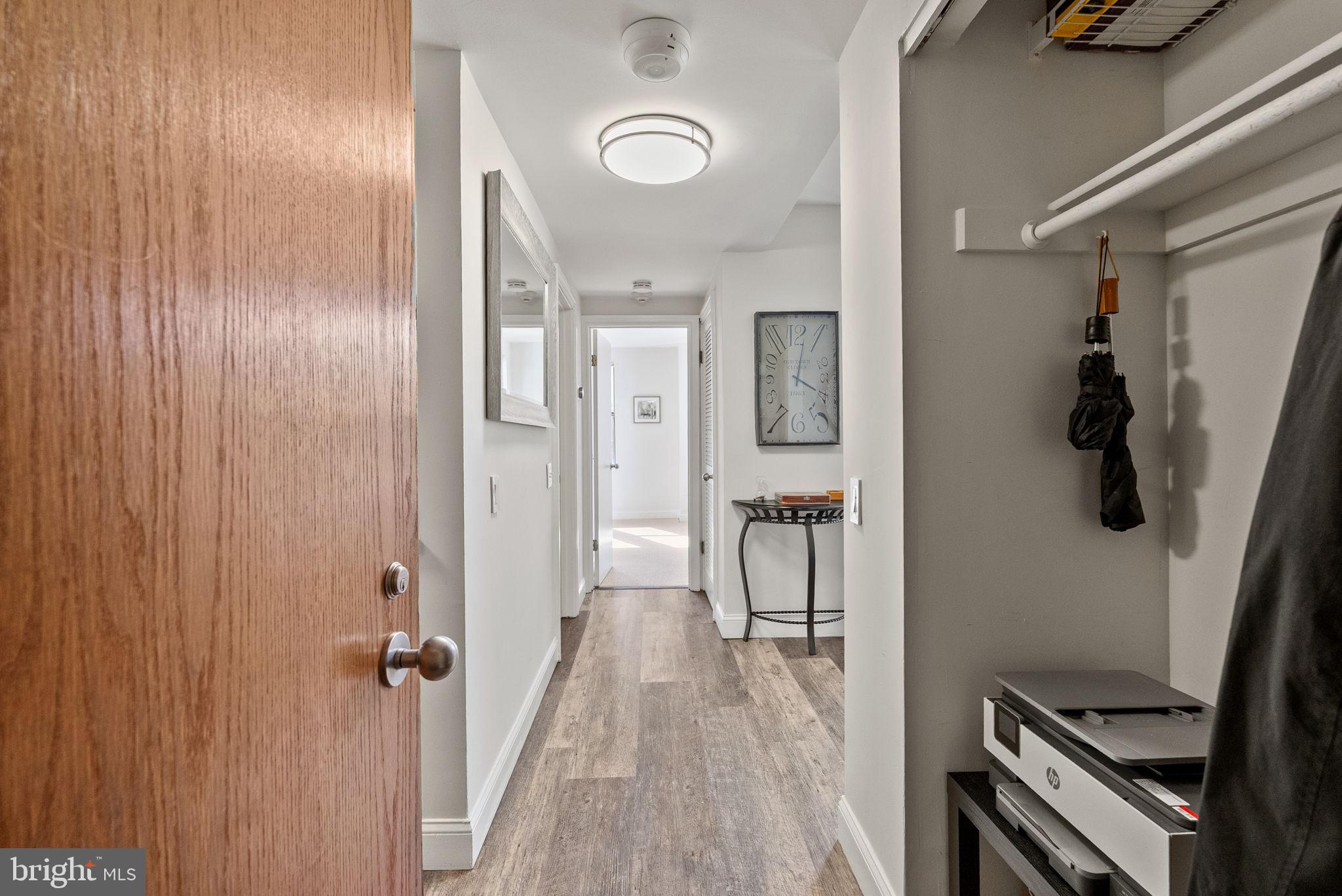 649 C Street Southeast, Unit 304 Washington, DC 20003 - Photo 6 of 37 a view of a room with wooden floor