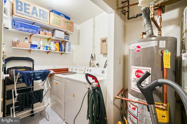 1633 D Street Southeast Washington, DC 20003 - Photo 26 of 38 a utility room with dryer washer and shoe rack
