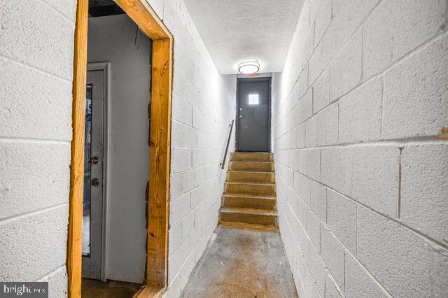 1633 D Street Southeast Washington, DC 20003 - Photo 32 of 38 a view of a hallway with wooden floor and staircase