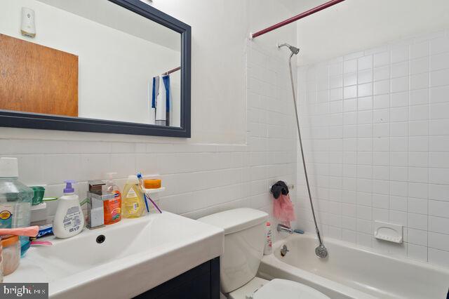 1633 D Street Southeast Washington, DC 20003 - Photo 33 of 38 a bathroom with a sink a toilet and shower