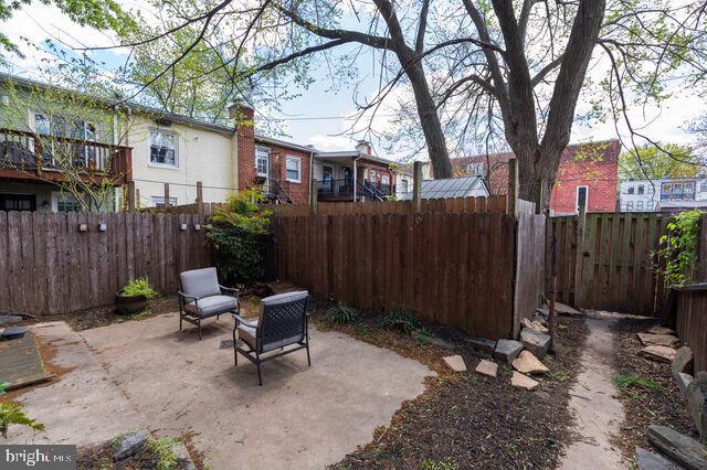 1633 D Street Southeast Washington, DC 20003 - Photo 38 of 38 a view of a backyard with a table and chairs