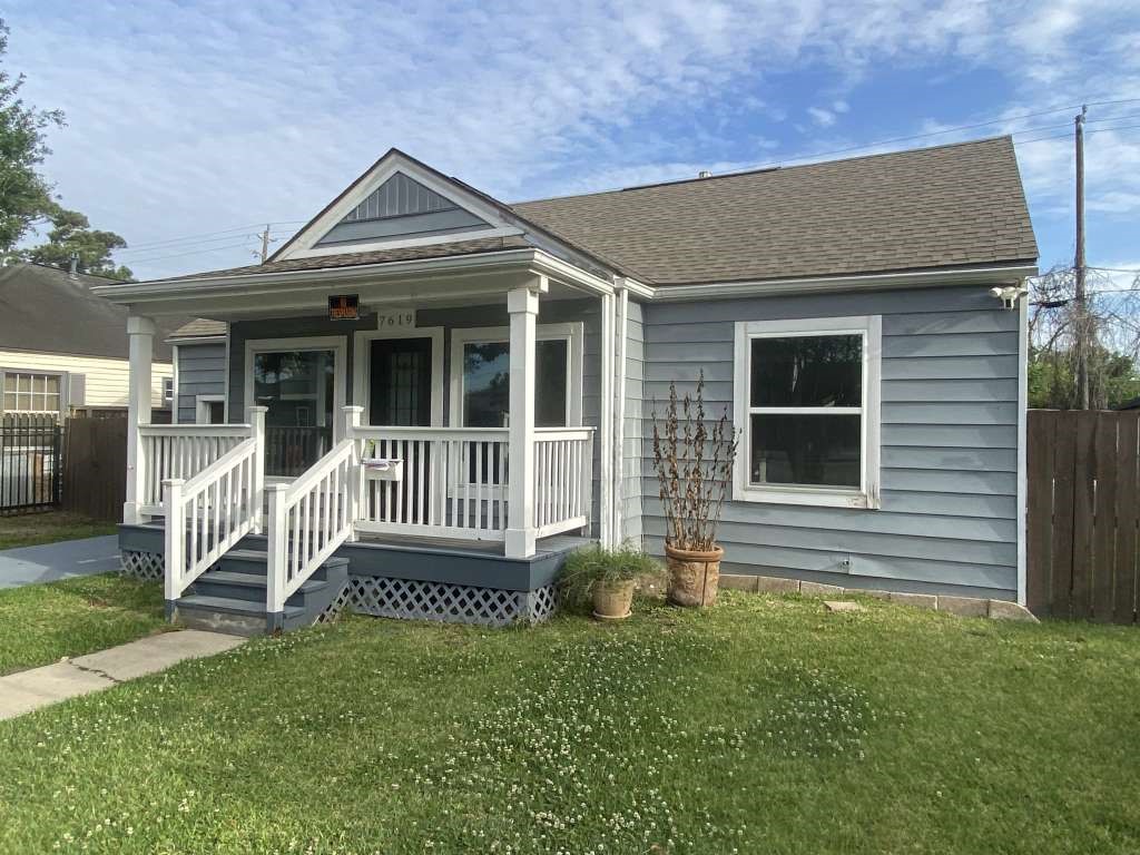 7619 Ilex Street Houston, TX 77012 - Photo 2 of 15 a front view of a house with garden
