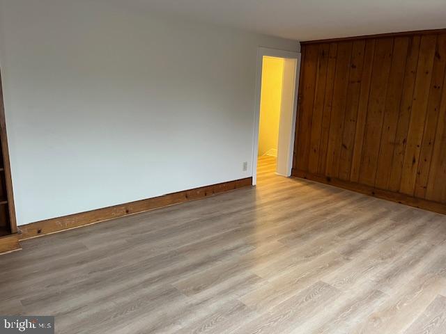 3617 Ferry Road, Unit 3 Fountainville, PA 18923 - Photo 5 of 8 a view of an empty room with wooden floor and a window
