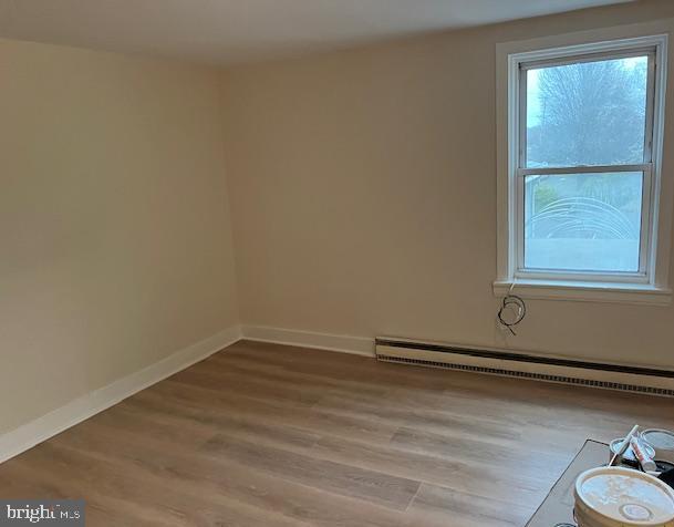 3617 Ferry Road, Unit 3 Fountainville, PA 18923 - Photo 7 of 8 a room with window and wooden floor