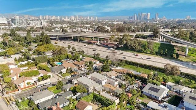 a picture of a bench in front of a window