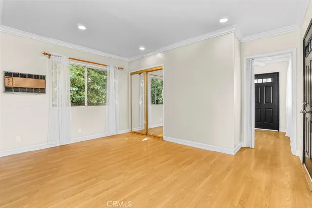 a kitchen with a stove a sink and a refrigerator