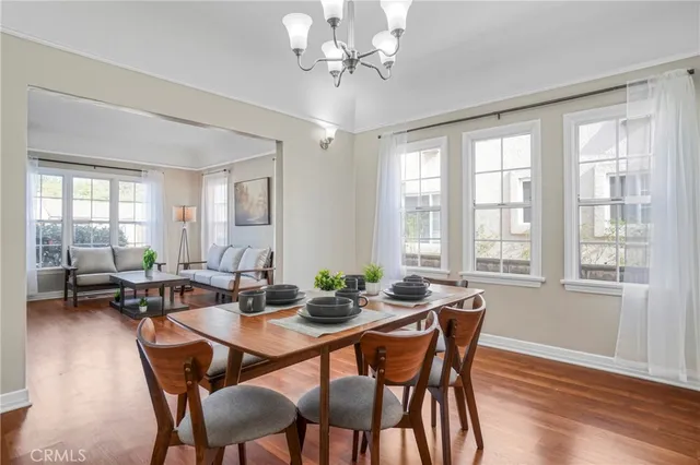 a large kitchen with a sink and cabinets