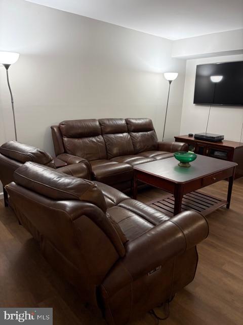 7 Rockford Road, Unit B007 Wilmington, DE 19806 - Photo 4 of 9 a living room with furniture and a flat screen tv