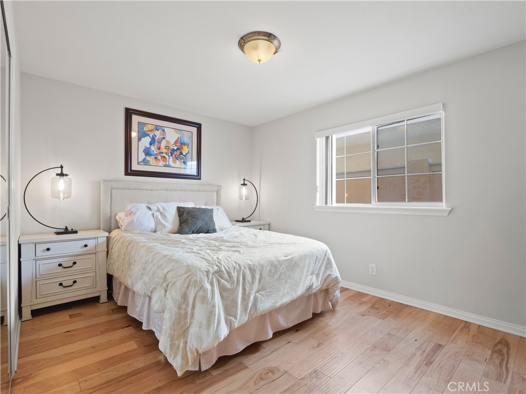 2517 Rockefeller Lane, Unit B Redondo Beach, CA 90278 - Photo 22 of 36 a bedroom with a bed and a window