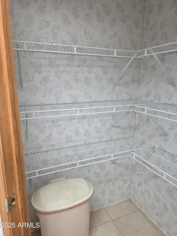 a bathroom with a shower and a toilet