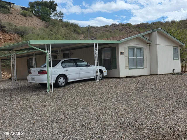 a car parked in front of a house