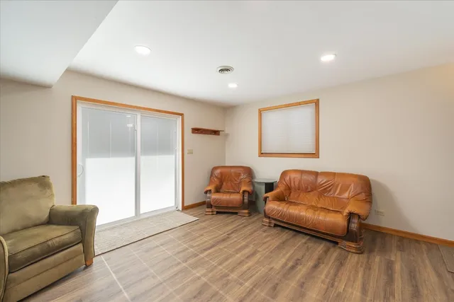 a bedroom with furniture and a couch