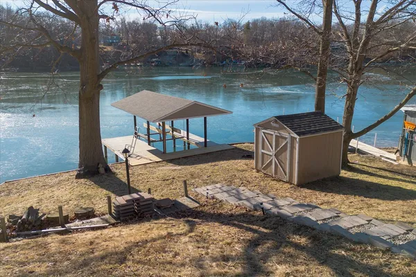 a view of a lake with a large trees