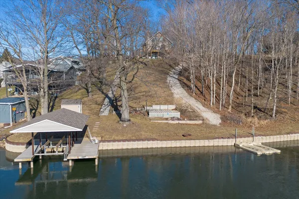 a view of a lake with a yard