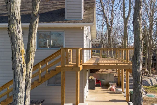 a view of a brick house with large windows