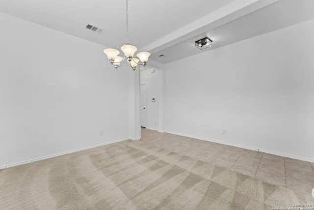 a view of a chandelier fan