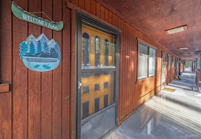 a view of a hallway with a furniture