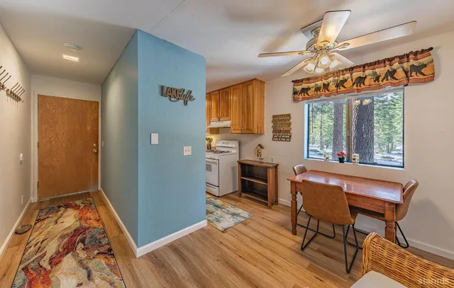a view of a livingroom with furniture and window
