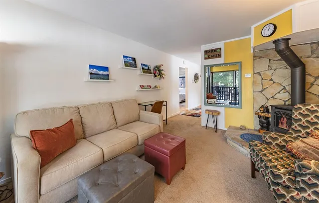 a living room with furniture and a couch
