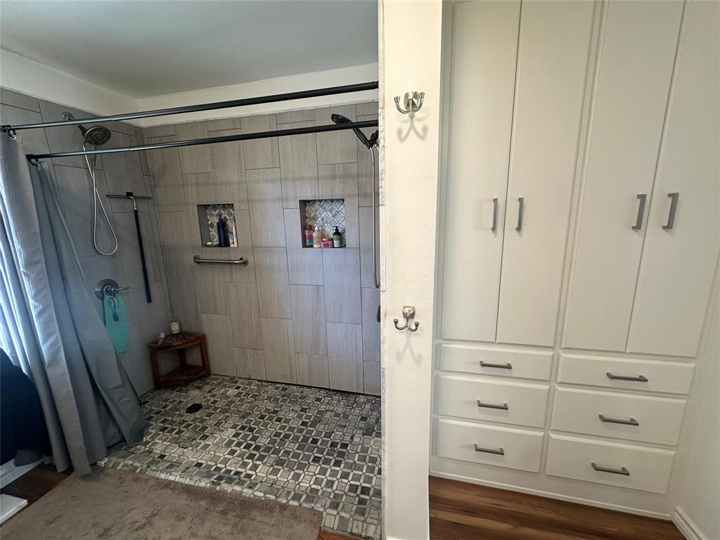 2387 Forehand Road Trinidad, TX 75163 - Photo 16 of 25 a bathroom with a shower and a sink