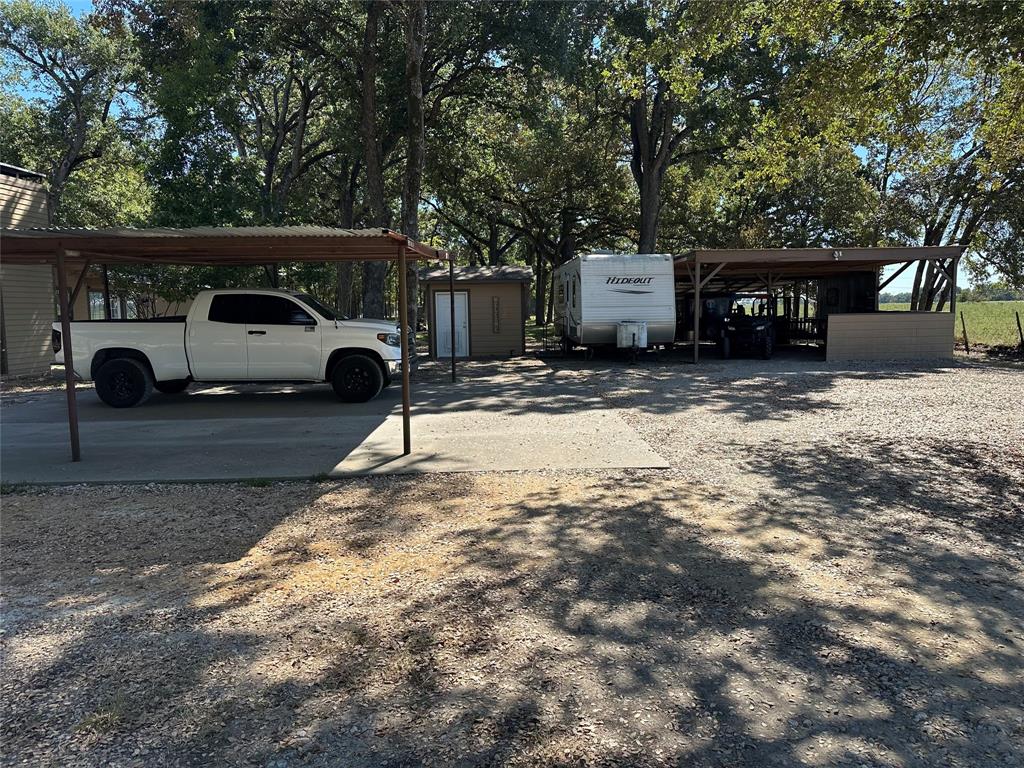 2387 Forehand Road Trinidad, TX 75163 - Photo 8 of 25 a front view of a house with a yard