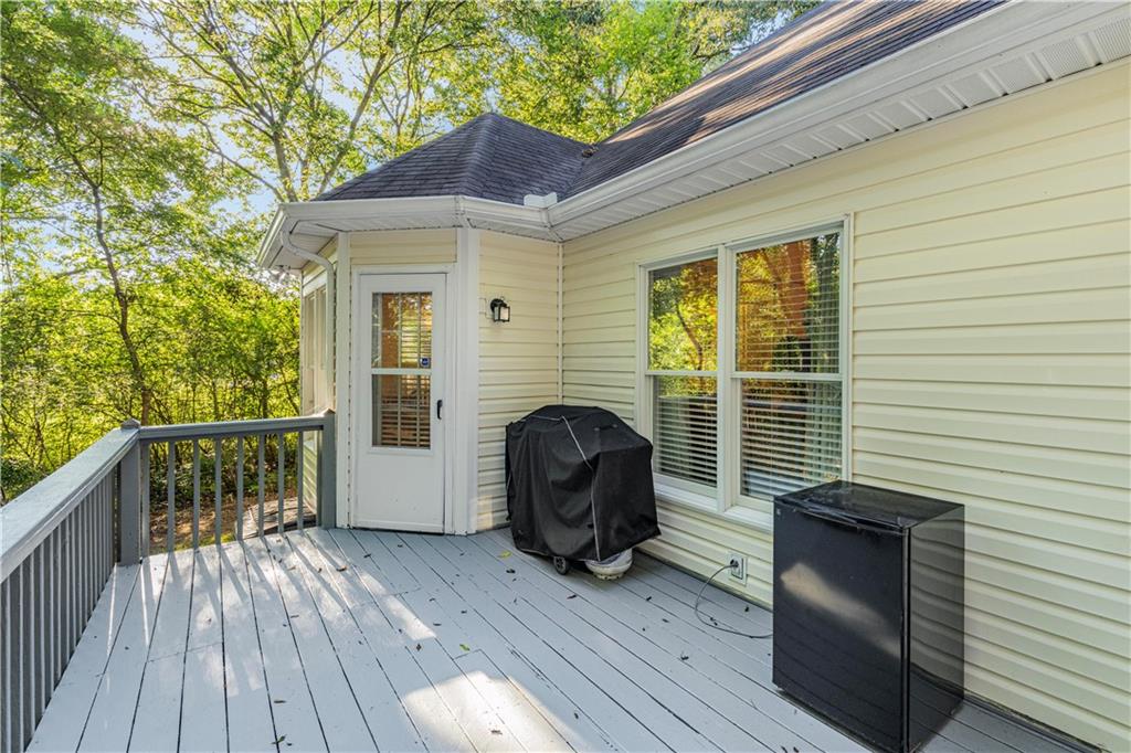 137 Hunters Trail Calhoun, GA 30701 - Photo 26 of 33 a front view of a house with balcony and wooden floor