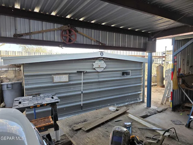a view of a livingroom with furniture and furniture