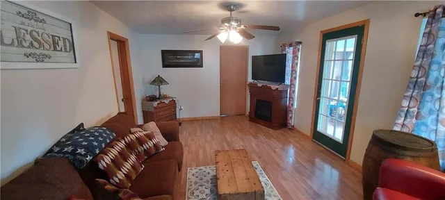 a bedroom with a bed and a mirror