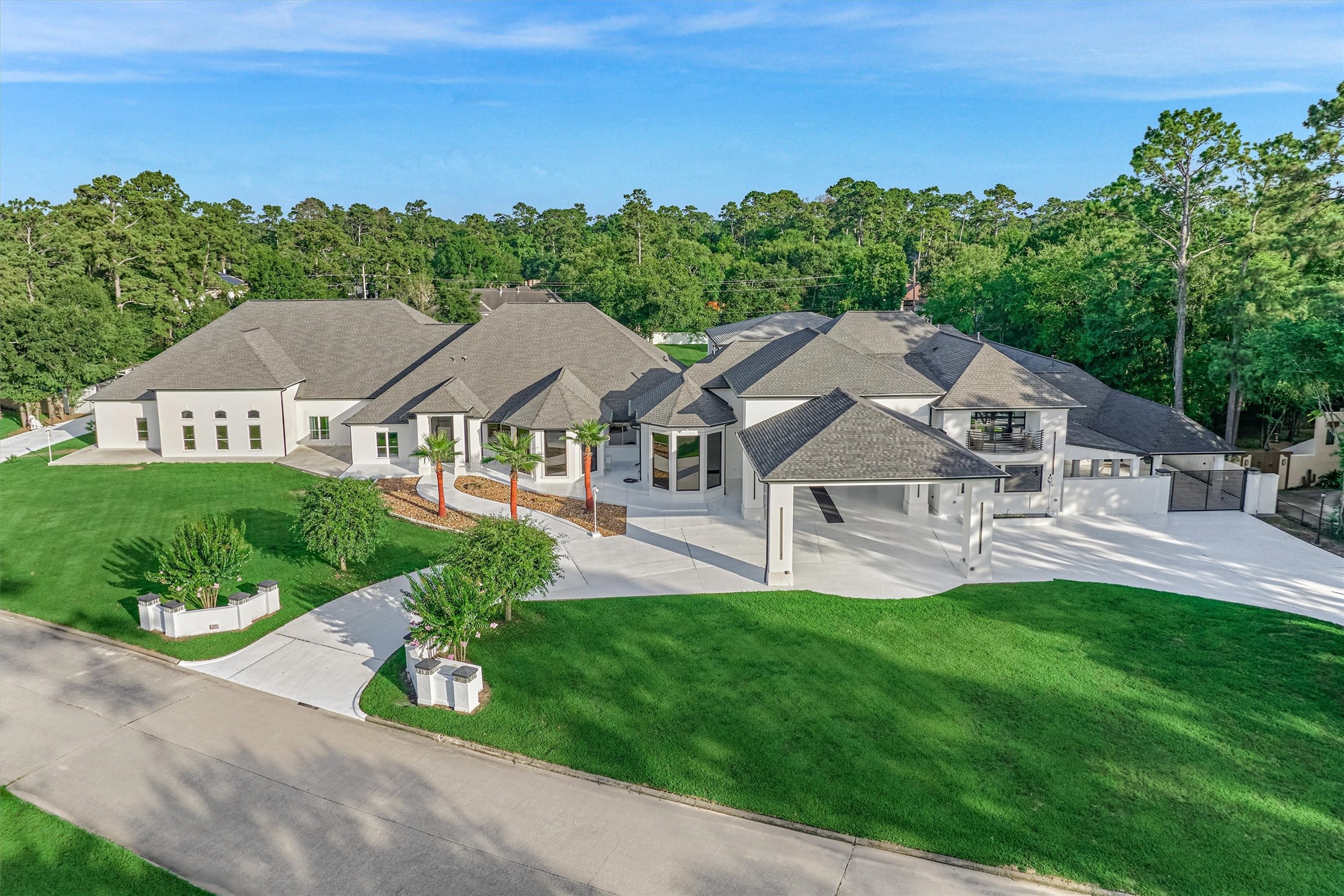 1907 Woerner Road Houston, TX 77090 - Photo 1 of 50 Exceptionally crafted multigenerational home on a sprawling 2.21-acre property has been completely rebuilt and is situated in a prime location!