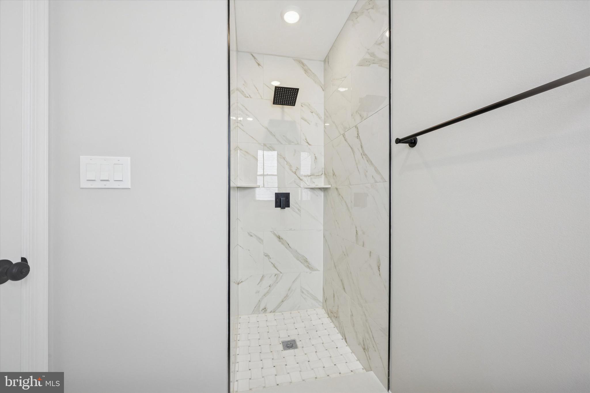 19 Rivanna Road New Castle, DE 19720 - Photo 15 of 26 a bathroom with a glass shower door