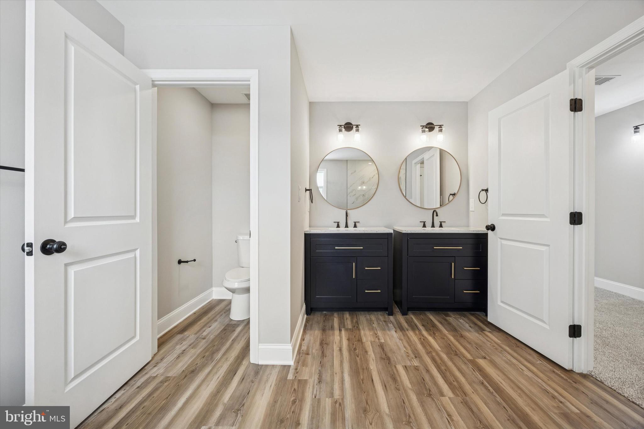 19 Rivanna Road New Castle, DE 19720 - Photo 20 of 26 a room with a sink and a mirror