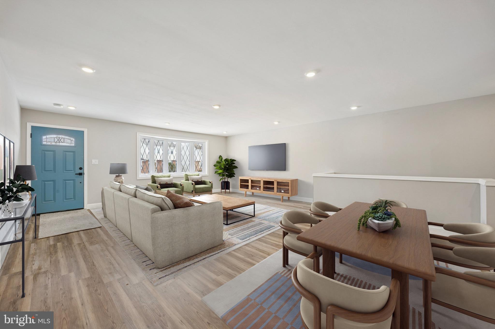 19 Rivanna Road New Castle, DE 19720 - Photo 2 of 26 a living room with furniture and a wooden floor